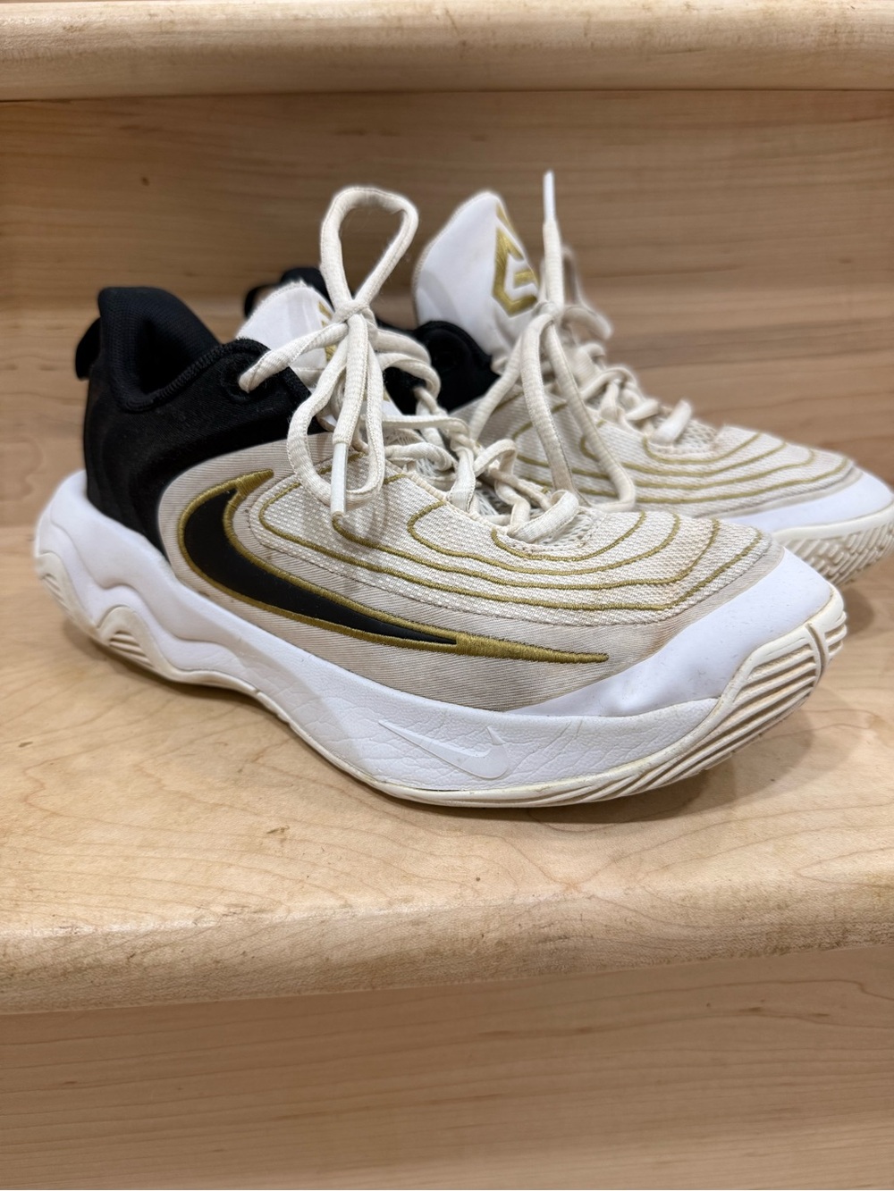 Nike Giannis Boys. White, Black & Gold Curved Swoosh Lace-Up Sneakers